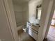 Bathroom featuring a shower-tub combo and vanity with a large mirror at 4770 Topaz St # 31, Las Vegas, NV 89121