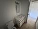 Bathroom with single sink vanity, mirror, and tile flooring at 4770 Topaz St # 31, Las Vegas, NV 89121