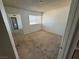 Bedroom featuring natural light, carpet, a closet, and access to an attached bathroom at 4770 Topaz St # 31, Las Vegas, NV 89121