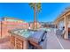 Private backyard featuring a hot tub, pool, and meticulously designed patio for ultimate relaxation at 52 Vallejo Verde St, Henderson, NV 89012