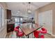 Dining room area with a view of kitchen and living spaces, creating an open feel at 52 Vallejo Verde St, Henderson, NV 89012