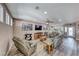 Inviting living room with comfortable seating, ceiling fan, and natural light at 52 Vallejo Verde St, Henderson, NV 89012