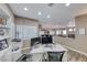 Bright home office space with built-in shelves, leading to the living area and kitchen at 52 Vallejo Verde St, Henderson, NV 89012