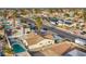 Aerial shot showcases the property's pool, yard, and neighborhood surroundings, with ample street parking available at 5399 Surrey St, Las Vegas, NV 89119