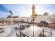 Spacious backyard patio with dining set and grill, perfect for outdoor gatherings at 5399 Surrey St, Las Vegas, NV 89119