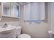 Neutral bathroom with tile and a white shower curtain at 5399 Surrey St, Las Vegas, NV 89119