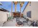 Cozy backyard patio with a fire pit, perfect for outdoor relaxation and social gatherings at 5399 Surrey St, Las Vegas, NV 89119