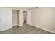 Bedroom features wood-look floors and a closet at 555 E Silverado Ranch Blvd # 2033, Las Vegas, NV 89183