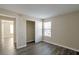 Neutral bedroom with wood-look floors and a closet at 555 E Silverado Ranch Blvd # 2033, Las Vegas, NV 89183