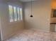 Bright dining area with marble floors and plantation shutters allowing natural light at 5748 Spring Ranch Pkwy, Las Vegas, NV 89118