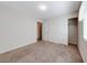 Bedroom view with carpet flooring and natural lighting and adjacent closet space at 6028 Stern Cove Ct, North Las Vegas, NV 89031