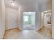 Inviting entryway with tiled flooring leading to the rooms in the home at 6028 Stern Cove Ct, North Las Vegas, NV 89031