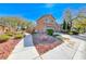 Charming two-story home with landscaped front yard and attached two-car garage at 6028 Stern Cove Ct, North Las Vegas, NV 89031