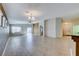 Spacious living area with tile flooring and a ceiling fan at 6028 Stern Cove Ct, North Las Vegas, NV 89031