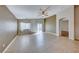 Bright and airy living room with sliding glass doors and tile flooring at 6028 Stern Cove Ct, North Las Vegas, NV 89031