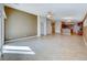 Expansive living room featuring tile flooring and ample natural light at 6028 Stern Cove Ct, North Las Vegas, NV 89031