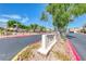 Inviting Riverwalk Ranch Cove neighborhood entrance sign with a well-maintained street at 6028 Stern Cove Ct, North Las Vegas, NV 89031