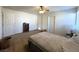 Spacious bedroom with neutral carpet and multiple doors for ample access at 628 Avenue L, Boulder City, NV 89005