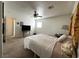 Bedroom featuring neutral carpet and a ceiling fan with lights at 628 Avenue L, Boulder City, NV 89005