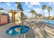 Community spa with blue tile and palm trees at 6317 Beige Bluff St # 3, North Las Vegas, NV 89081