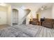 Living room showing hard surface floors and two arm chairs at 6317 Beige Bluff St # 3, North Las Vegas, NV 89081