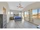 Spacious bedroom featuring lots of natural light and vinyl floors at 6329 Aloha Sue St, North Las Vegas, NV 89031