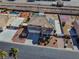 Aerial view of the home with a large backyard featuring a pool, a basketball court and desert landscaping at 6689 Sparks Ave, Las Vegas, NV 89142
