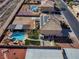 Aerial view of property highlighting the pool, backyard landscaping, and solar panels at 6689 Sparks Ave, Las Vegas, NV 89142
