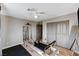 Spare bedroom set up as a gym with full pilates machine and mirrored wall at 6689 Sparks Ave, Las Vegas, NV 89142