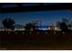Backyard basketball court overlooking the dazzling Las Vegas city skyline at night at 6689 Sparks Ave, Las Vegas, NV 89142