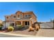 Beautiful two-story home showcasing a well-manicured front yard, a three-car garage, and a charming entrance at 6689 Sparks Ave, Las Vegas, NV 89142