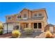 Charming two-story home with a well-maintained front yard and welcoming entrance at 6689 Sparks Ave, Las Vegas, NV 89142