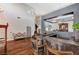 Spacious living room featuring a large bar and hardwood floors at 6689 Sparks Ave, Las Vegas, NV 89142