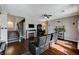 Inviting living room features a fireplace and dark hardwood floors at 6689 Sparks Ave, Las Vegas, NV 89142