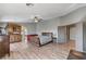 Bright main bedroom with wood floors, large windows, and ceiling fan at 6689 Sparks Ave, Las Vegas, NV 89142