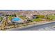 A birds eye view of the community pool and recreation area provides a sense of community and amenities at 697 Sunray Park St, Henderson, NV 89011