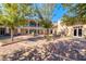 Picturesque courtyard with lush landscaping and attractive brickwork at 697 Sunray Park St, Henderson, NV 89011