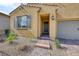 Inviting front entrance with a brick pathway and a stylish front door at 697 Sunray Park St, Henderson, NV 89011