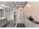 Luxury primary bathroom with walk-in shower and black shower rack at 7153 Grace Estate Ave, Las Vegas, NV 89113