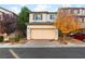 Charming two-story home with a two-car garage and a well-maintained front yard at 7253 Sterling Rock Ave, Las Vegas, NV 89178