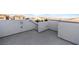 This rooftop deck provides a private outdoor space with stucco walls and concrete floors, perfect for relaxation and enjoying the view at 7253 Sterling Rock Ave, Las Vegas, NV 89178