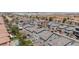 Neighborhood aerial view showcasing the community's layout, including backyard pools and proximity to the city at 7665 Sandhaven St, Las Vegas, NV 89139