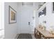 Inviting entryway featuring a white door, light walls, and a stylish console table at 7665 Sandhaven St, Las Vegas, NV 89139