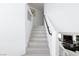 Bright stairway with modern railings leading to the upper level at 7665 Sandhaven St, Las Vegas, NV 89139