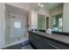 Bathroom with walk-in shower, large vanity, sleek fixtures, and modern design at 7999 Pinnacle Peak Ave, Las Vegas, NV 89113