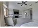 Spacious bedroom features a fireplace, sitting area, and plenty of natural light at 7999 Pinnacle Peak Ave, Las Vegas, NV 89113