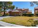 Charming two-story home features a well-manicured lawn and an attached two-car garage at 7999 Pinnacle Peak Ave, Las Vegas, NV 89113