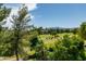This property offers beautiful views of the golf course, surrounded by mature trees and serene landscaping at 7999 Pinnacle Peak Ave, Las Vegas, NV 89113
