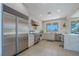 Kitchen featuring modern design, stainless steel appliances, and lots of light at 7999 Pinnacle Peak Ave, Las Vegas, NV 89113