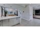 Open concept living area showcasing modern decor, neutral tones, with views into other rooms at 7999 Pinnacle Peak Ave, Las Vegas, NV 89113